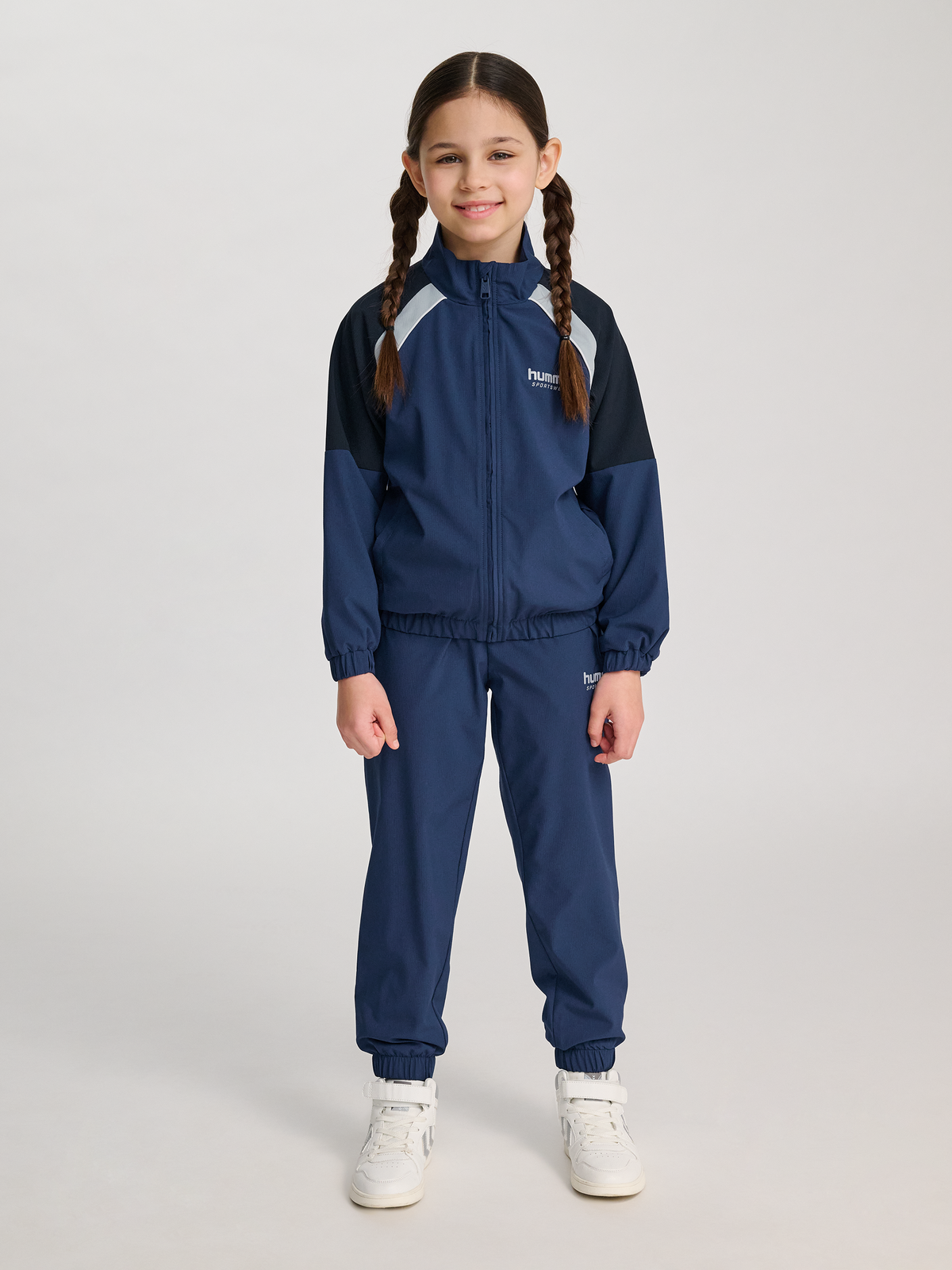 hmlJR LOOSE TRACKSUIT ZIP JACKET
