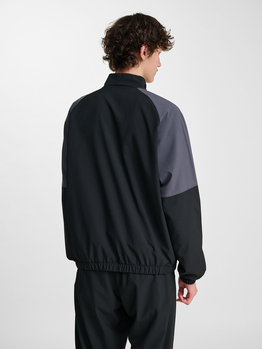 hmlLOOSE TRACK ZIPJACKET SPORTSWEAR