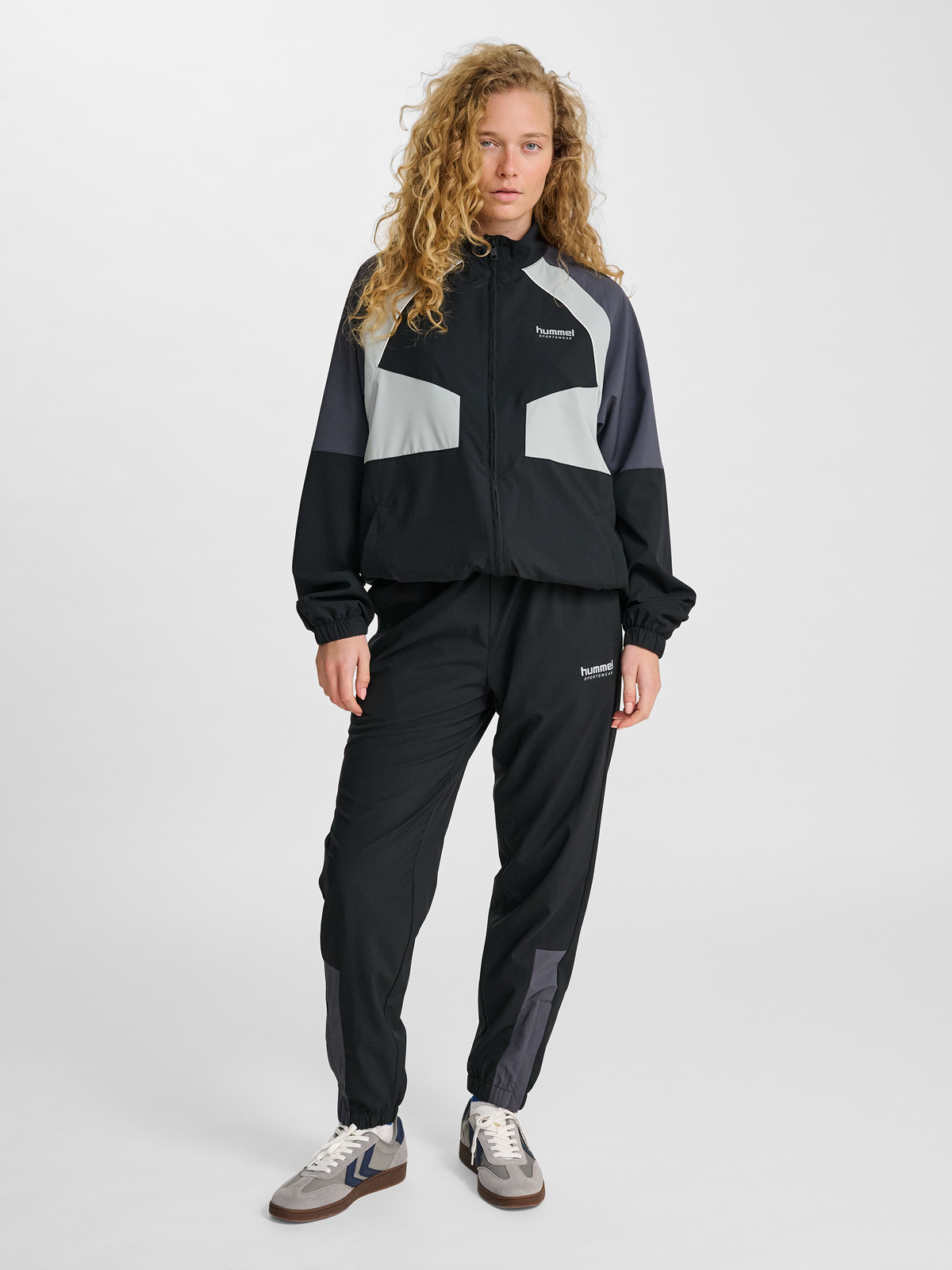 hmlLOOSE TRACK ZIPJACKET SPORTSWEAR