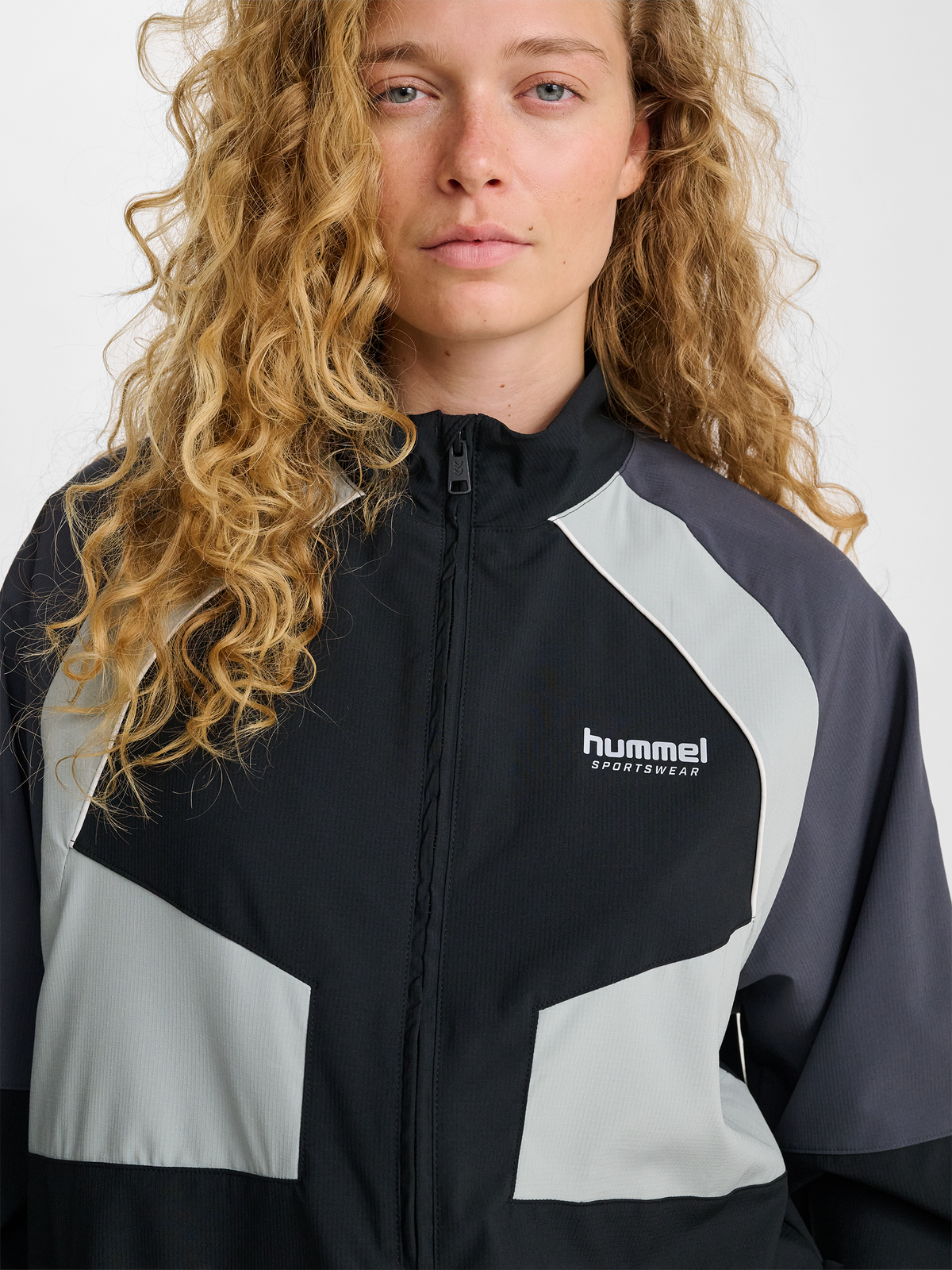 hmlLOOSE TRACK ZIPJACKET SPORTSWEAR